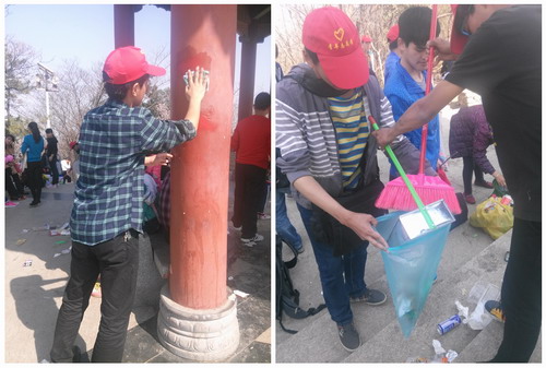 挂标语捡垃圾 倡导绿色出行--计算机学院开展学